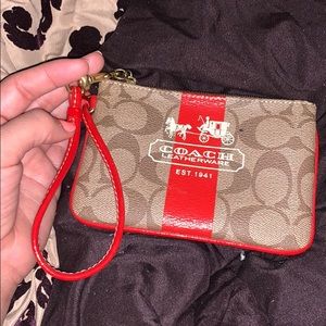 Coach wristlet. Perfect condition. Never used.